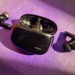 Black wireless earbuds product photo